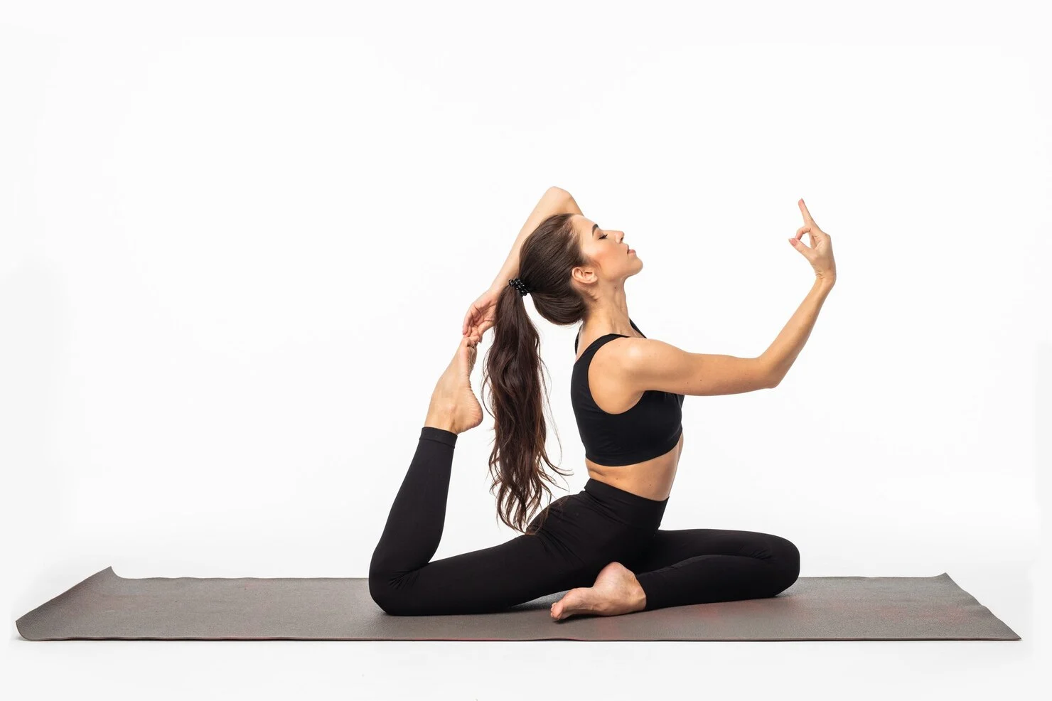 sporty-young-woman-doing-yoga-practice-isolated-white-surface-concept-healthy-life-natural-balance-body-mental-development_231208-12535